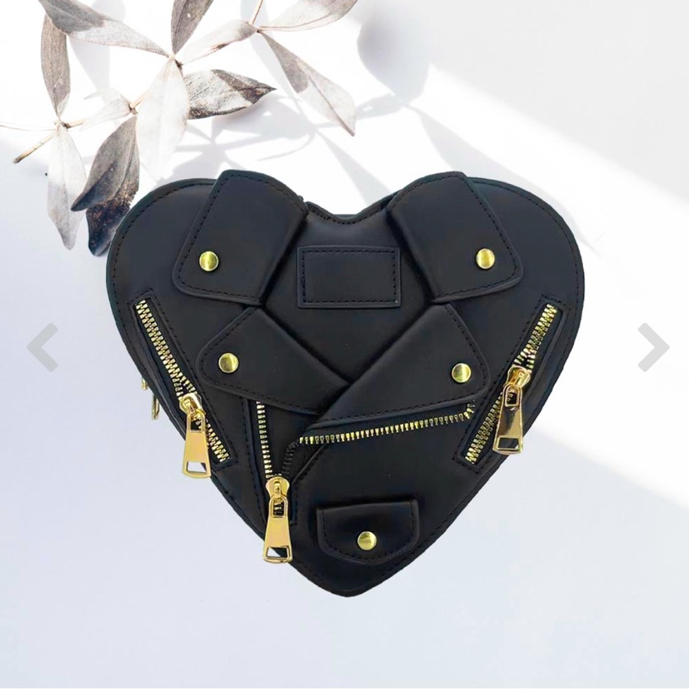Heart shaped “leather” jacket purse.